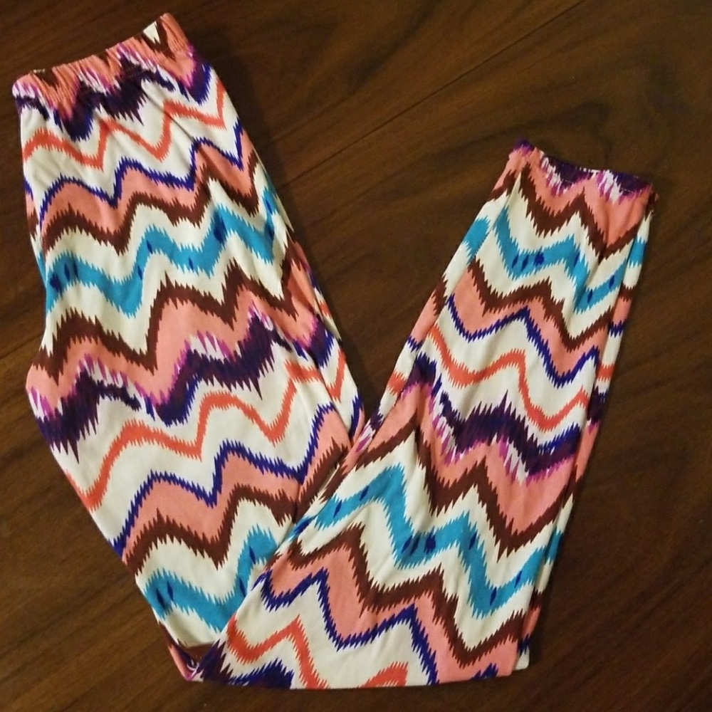 Super soft and cozy colorful Leggings. Never worn!